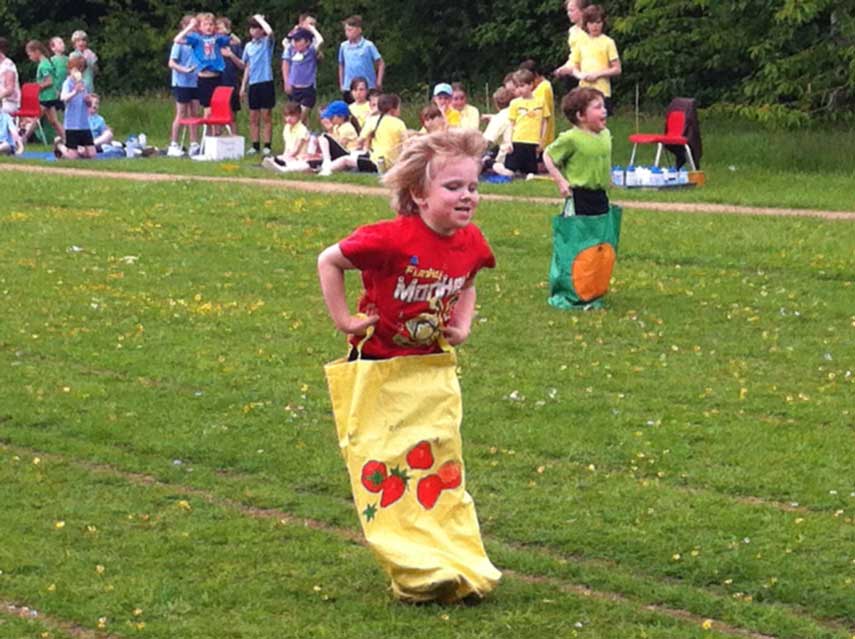 Running on Trail Norley Primary School Sports Day Dads Beanbag Race